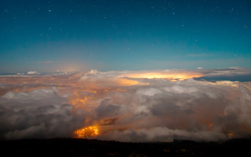 City Lights Through Clouds