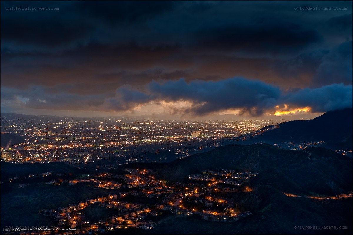 City lights under stormy sky