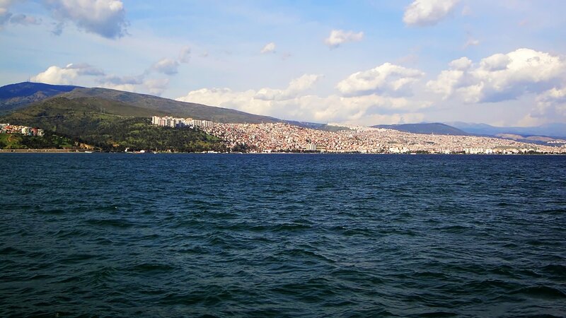 City on Hillside by Water