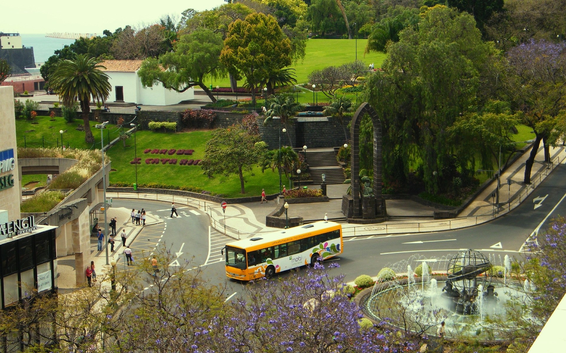 City park with bus and fountain