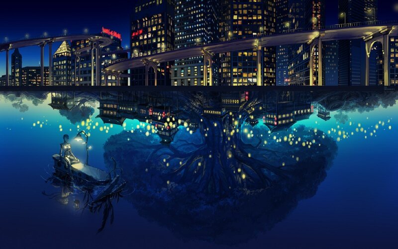 City reflected in water at night