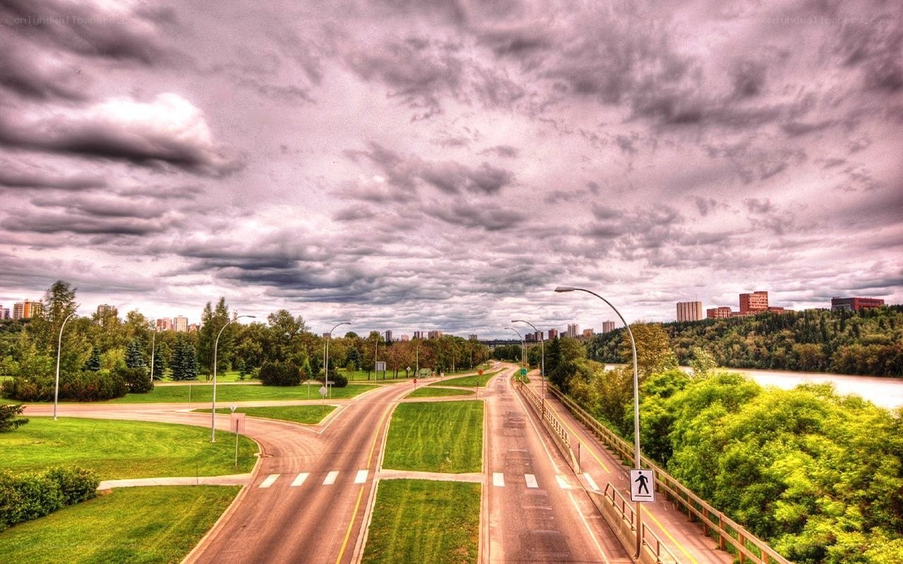 City road under cloudy sky