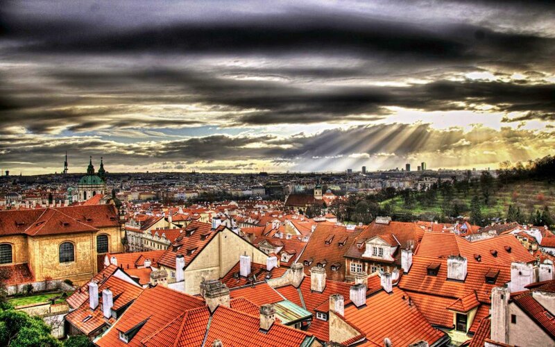 City Rooftops under Stormy Sky