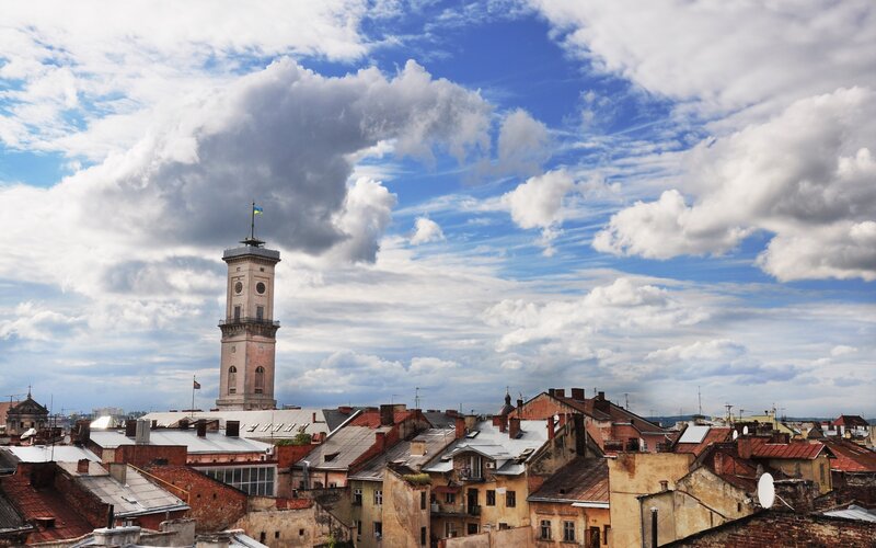 City rooftops with clock tower