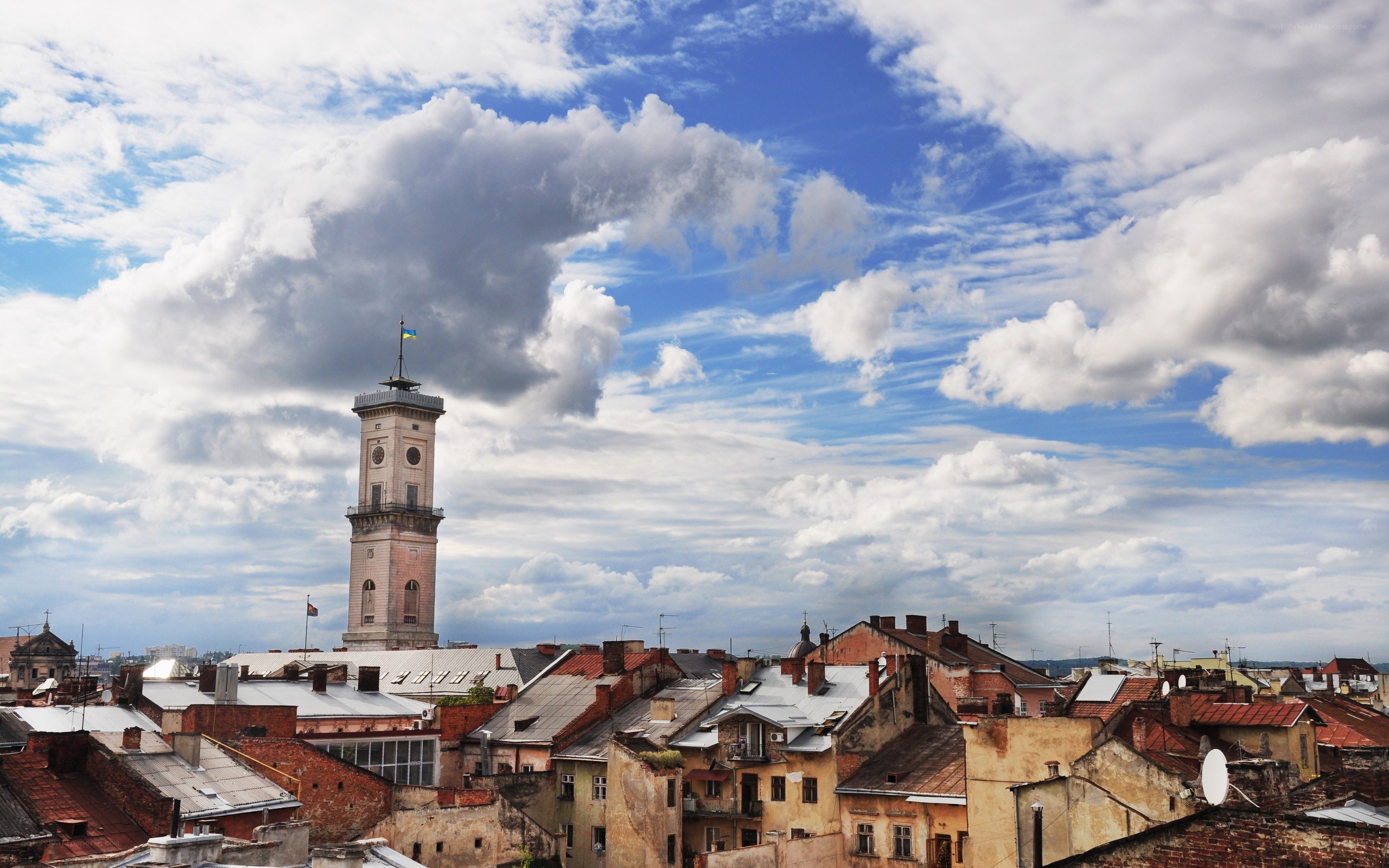 City rooftops with clock tower