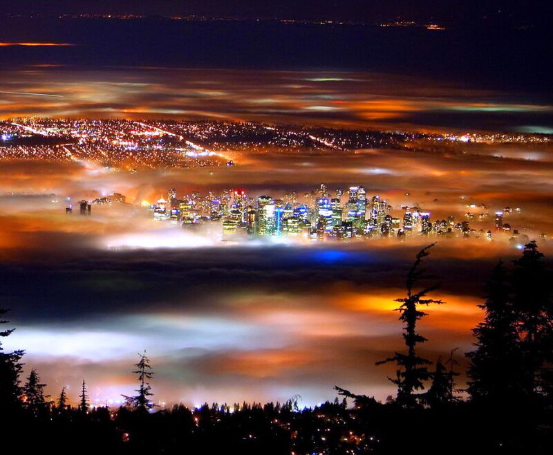 City Skyline Above Clouds — Orange