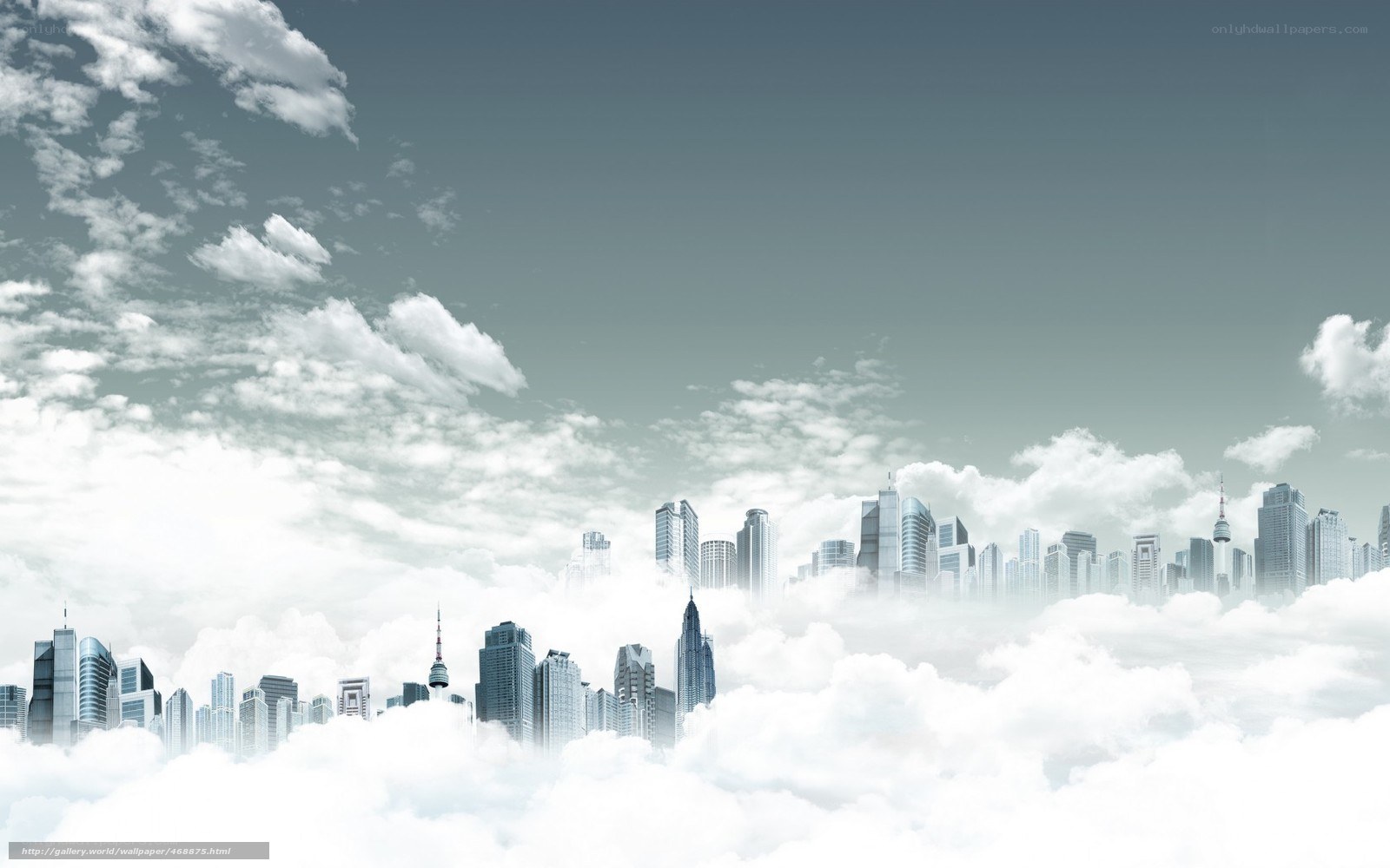 City skyline above clouds
