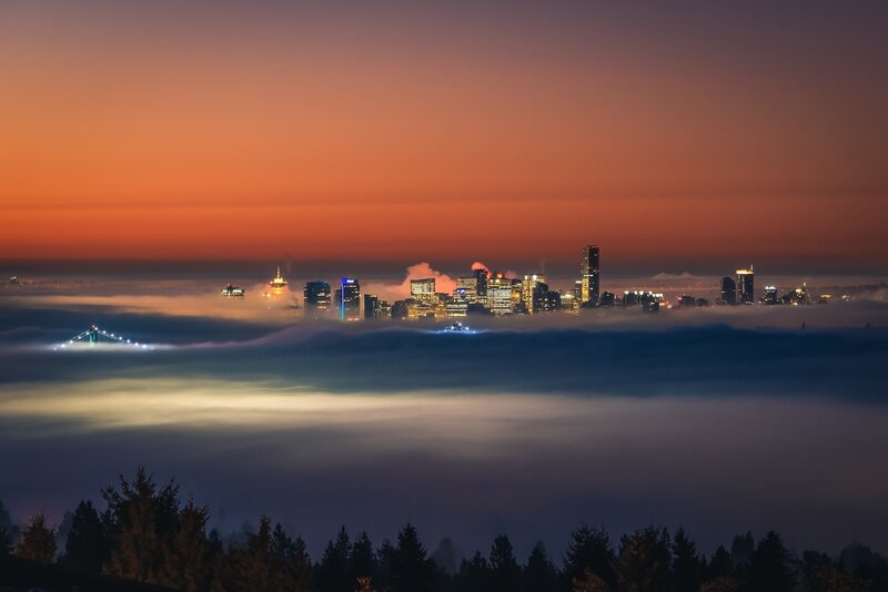 City Skyline Above Fog — Orange, Serene