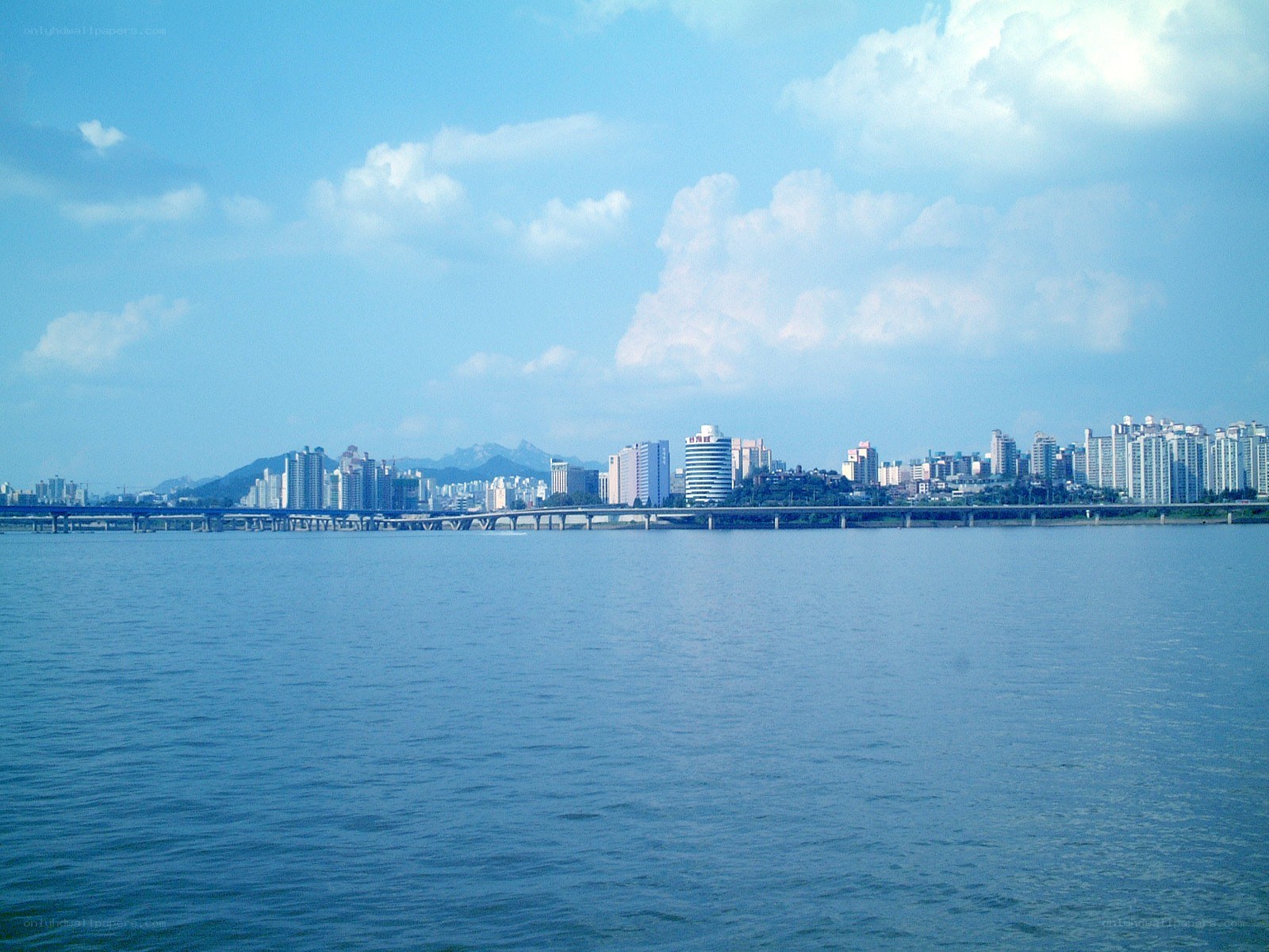City skyline across a river