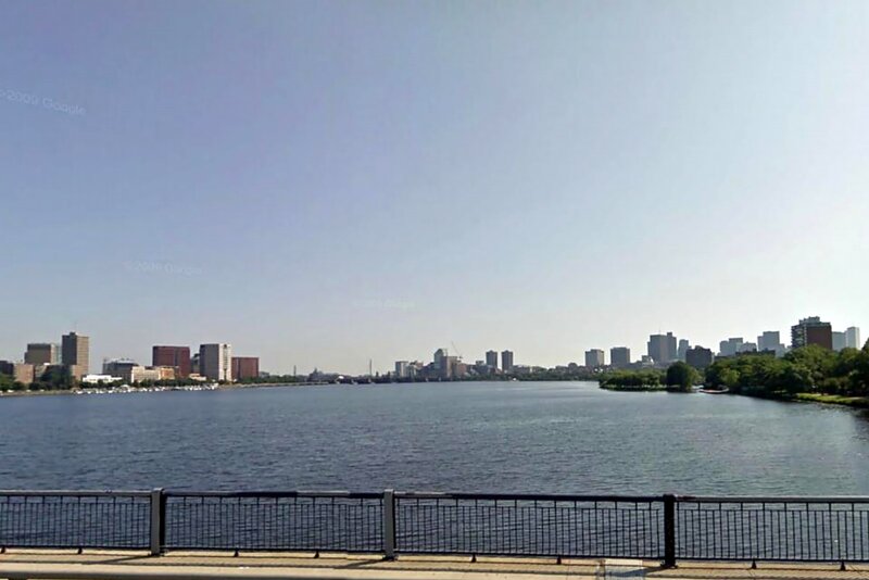 City Skyline Across River — Blue, Calm, Afternoon, Photograph