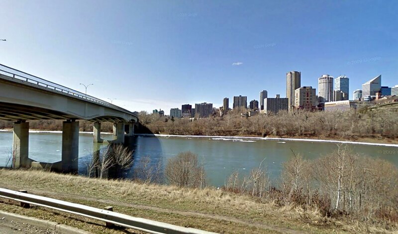 City Skyline Across River — Blue, Calm