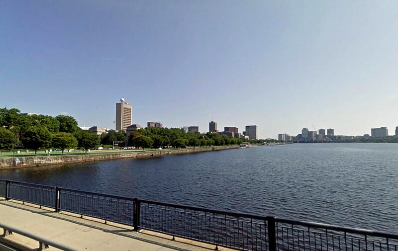 City Skyline Across River — Blue