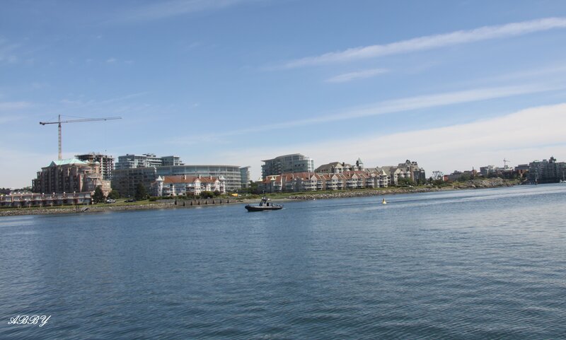 City Skyline Across Water — Blue, Calm