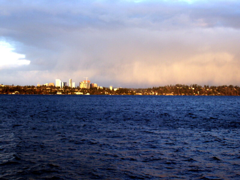City Skyline Across Water — Blue, Dramatic