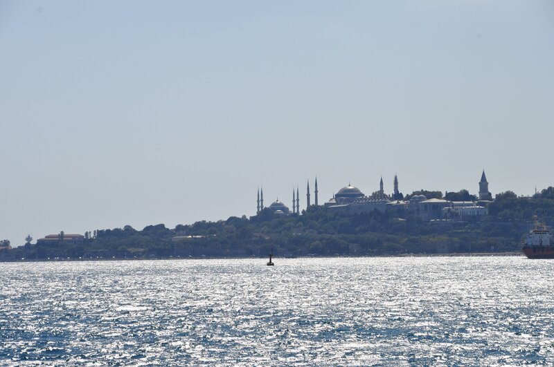 City Skyline Across Water — Blue, Serene, Afternoon, Photograph