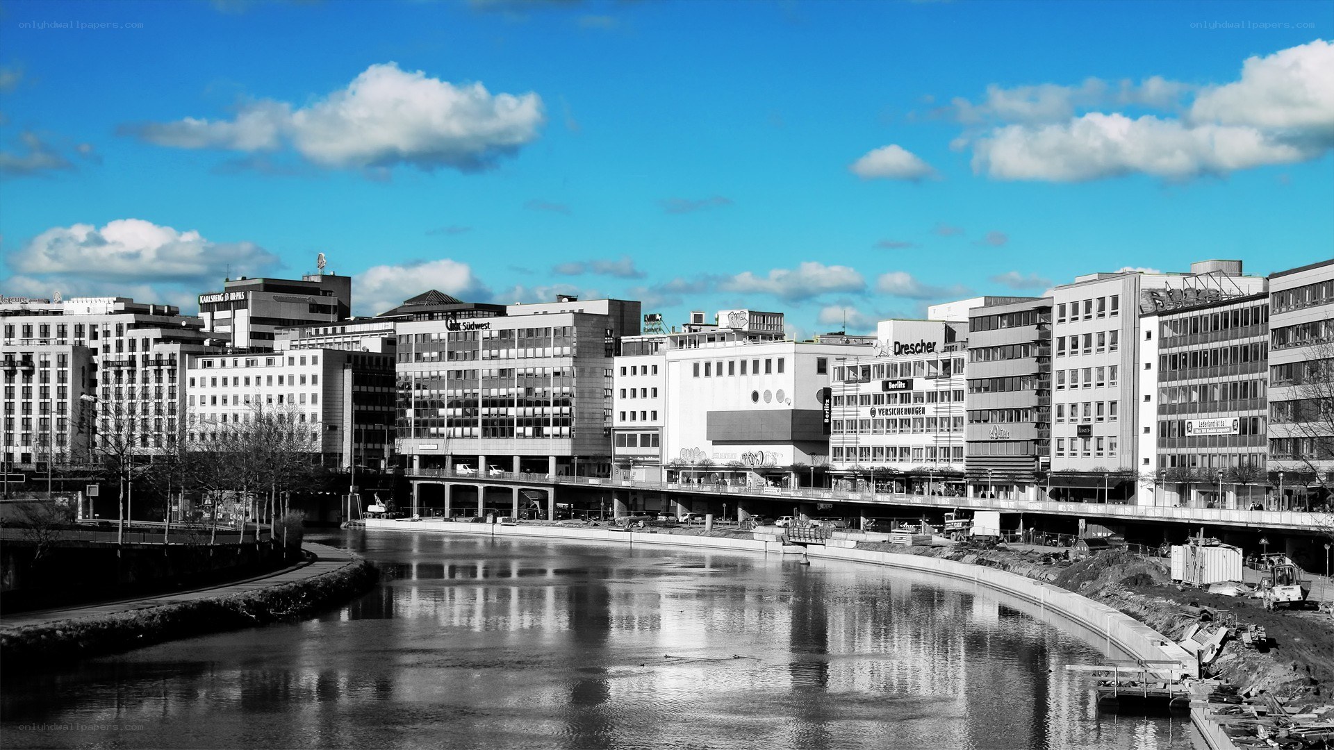 City skyline along a river