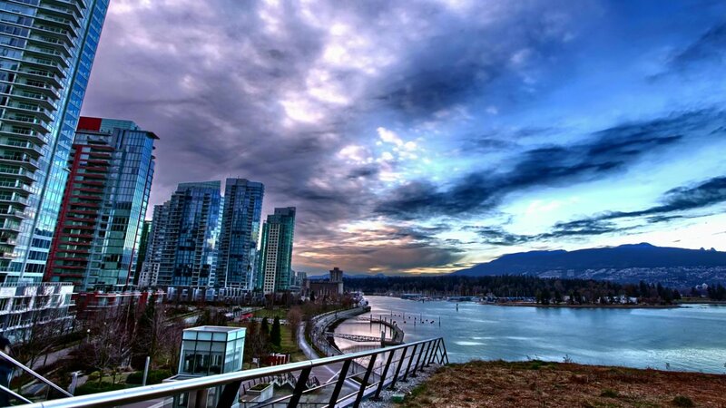 City Skyline at Dusk — Blue, Dramatic, Sunset, Photograph, Skyscrapers, River, Mountains