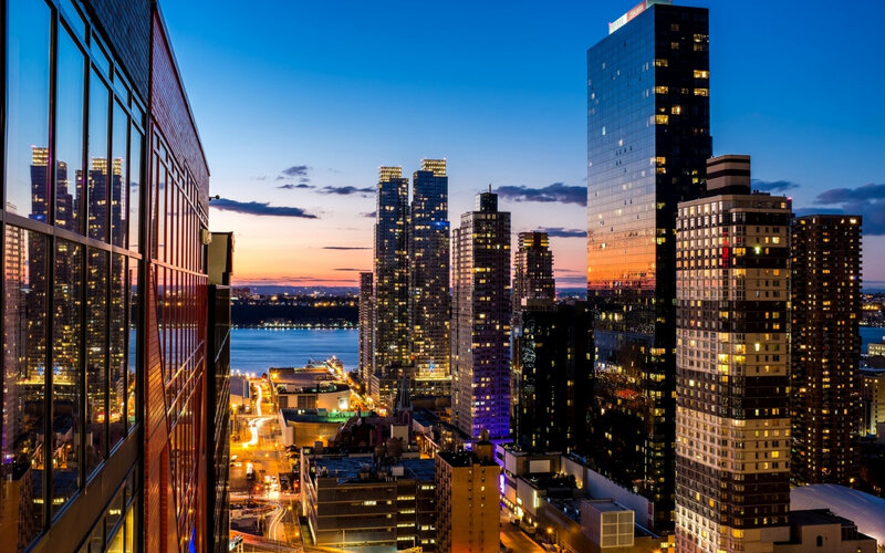 City Skyline at Dusk — Blue, Dramatic, Sunset, Photograph, Skyscrapers, River, Road