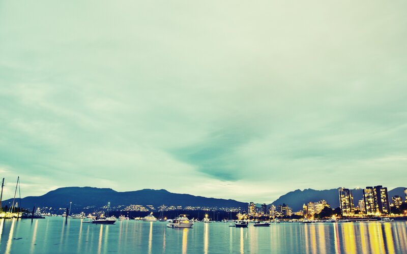 City Skyline at Dusk — Blue, Serene, Night, Photograph, Boats, Mountains, Buildings