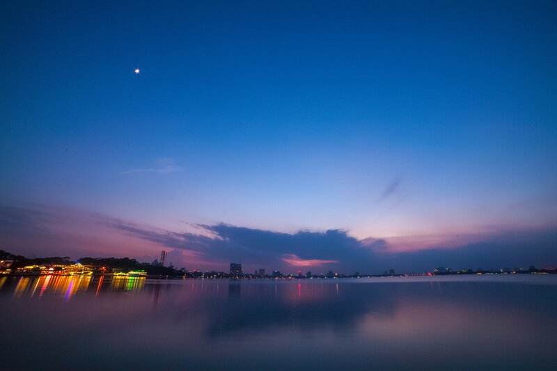 City Skyline at Dusk — Blue, Serene, Night, Photograph, Moon