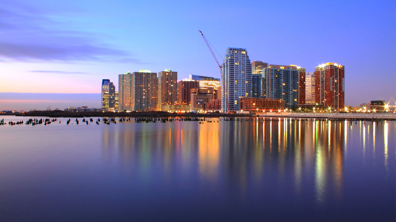 City Skyline at Dusk — Blue, Serene, Sunset, Photograph, Buildings, Crane