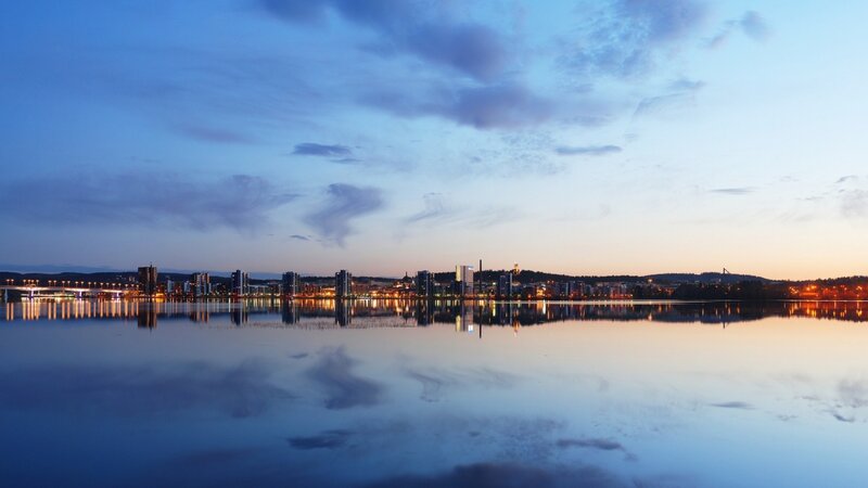 City Skyline at Dusk — Blue, Serene, Sunset, Photograph, Water