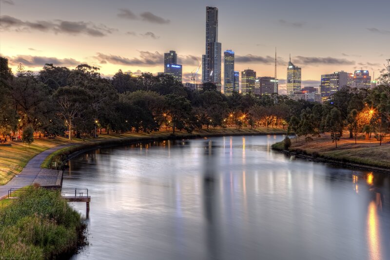 City skyline at dusk by the river