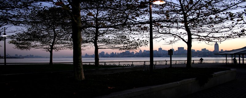 City skyline at dusk from waterfront