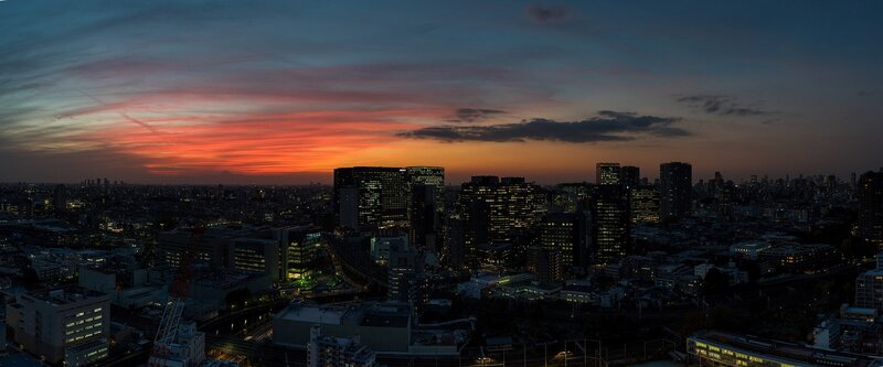 City Skyline at Dusk — Orange, Dramatic, Sunset, Photograph, Skyscrapers, Clouds, Crane