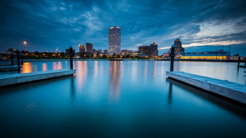 City skyline at dusk with piers