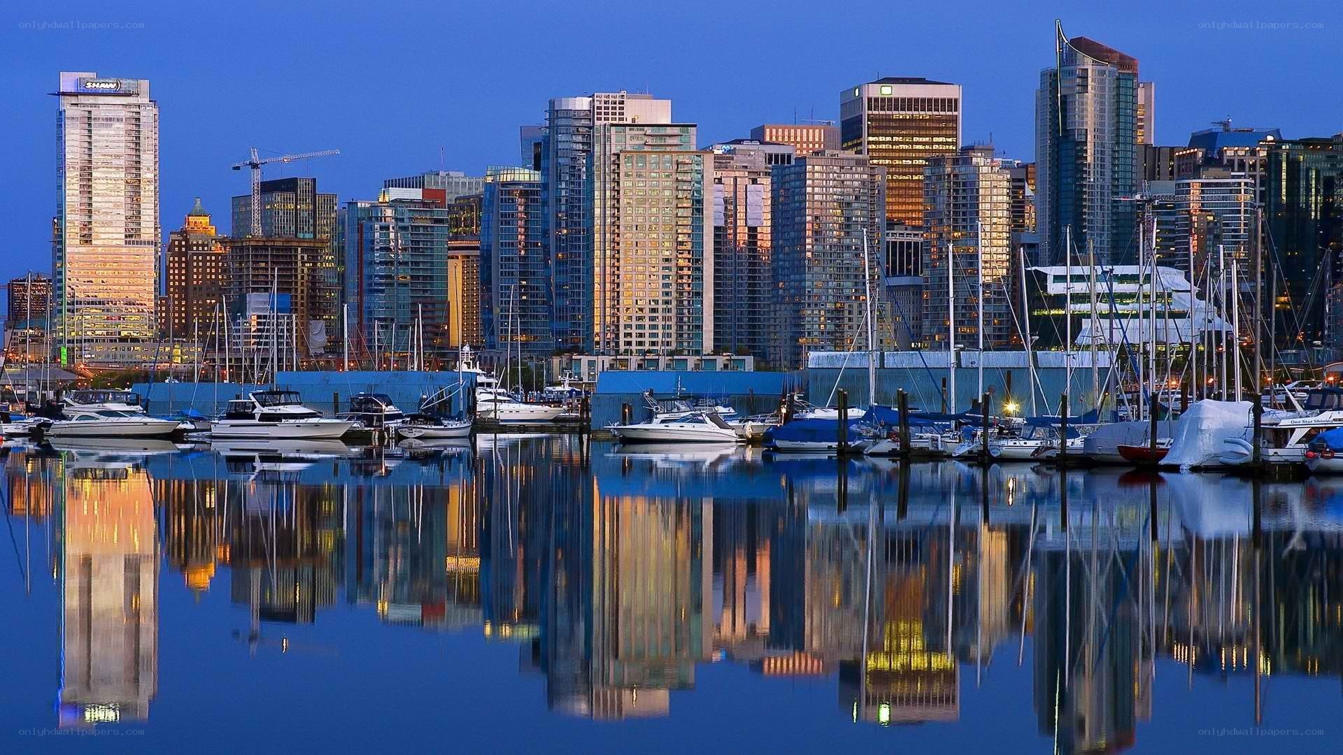 City skyline at dusk with reflections
