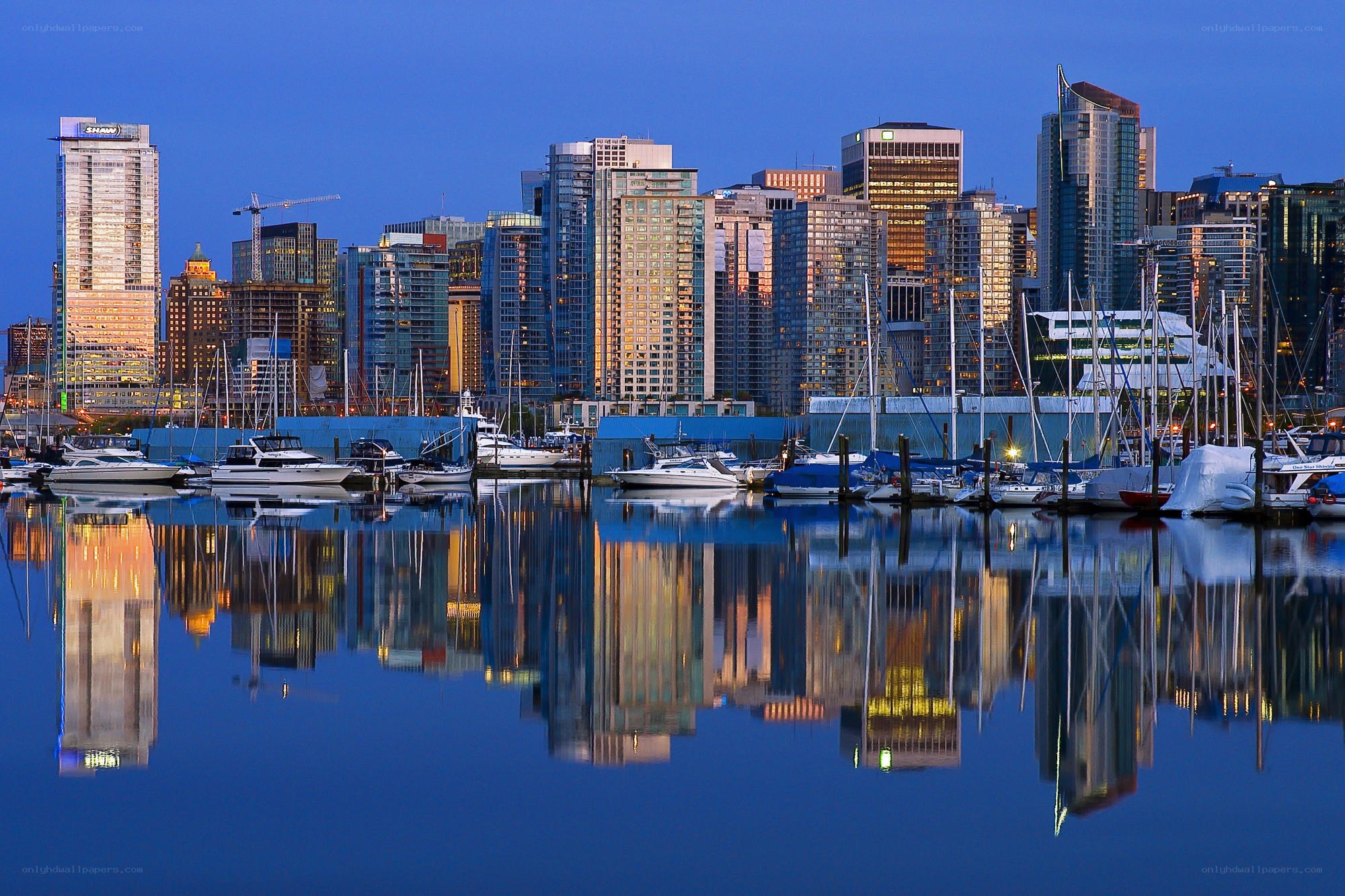 City skyline at dusk with reflections