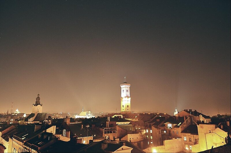 City Skyline at Night — Black, Calm, Photograph, Buildings, Clock Tower