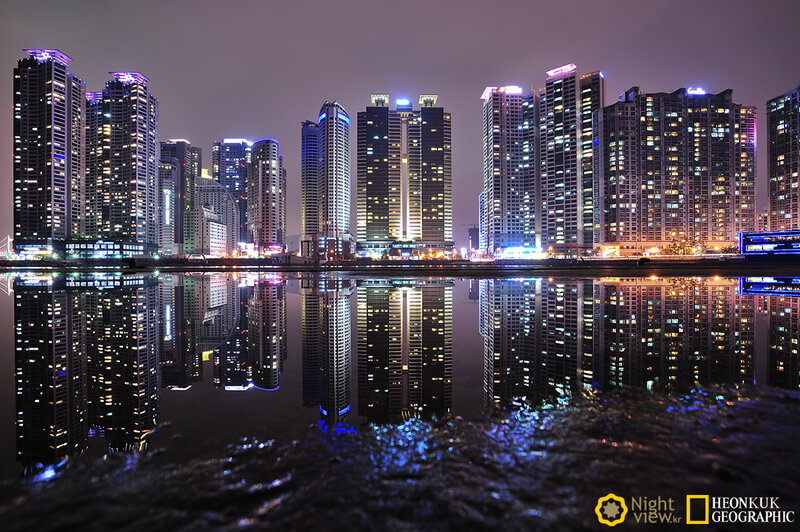 City Skyline at Night — Black, Calm, Photograph, Buildings, Reflection