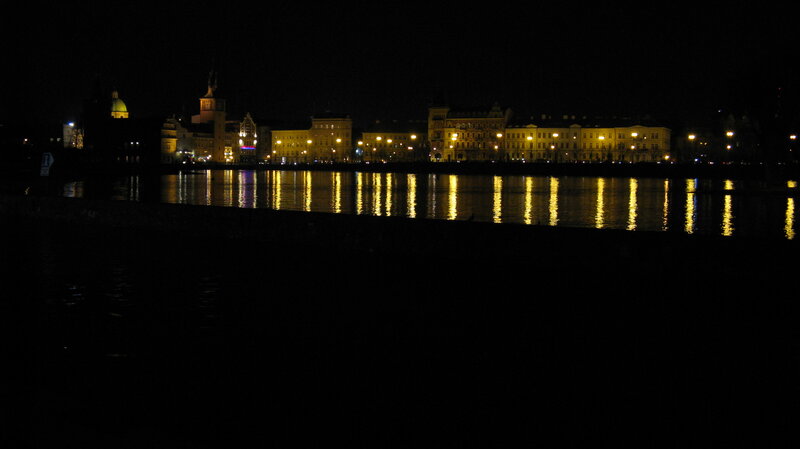 City Skyline at Night — Black, Calm, Photograph, Buildings, River, Lights