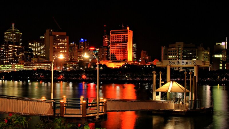 City Skyline at Night — Black, Calm, Photograph, River, Buildings, Dock
