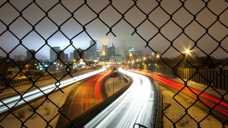City Skyline at Night — Black, Dramatic, Photograph, Chain-link Fence