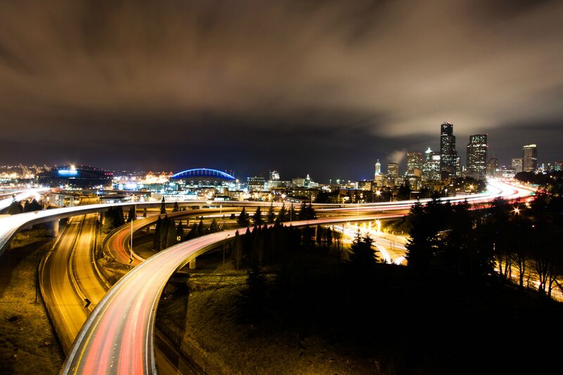 City Skyline at Night — Black, Dramatic, Photograph, Highway