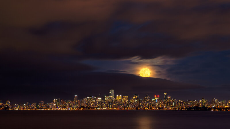 City Skyline at Night — Black, Dramatic, Photograph, Moon, Clouds, Water