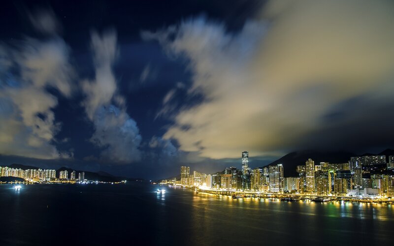 City Skyline at Night — Black, Dramatic, Photograph, Water, Clouds