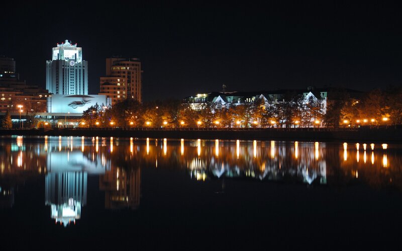 City Skyline at Night — Black, Serene, Photograph, Buildings, Trees