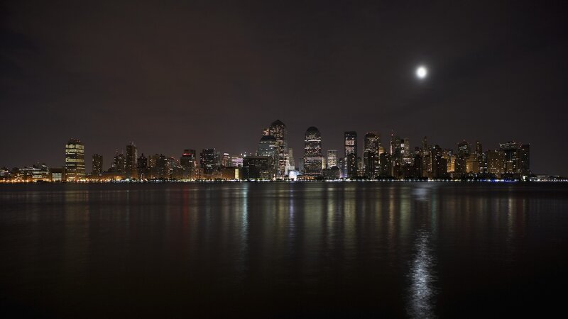 City Skyline at Night — Black, Serene, Photograph, Moon, Buildings, Water, Dark Blue
