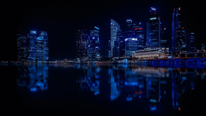 City Skyline at Night — Blue, Dark, Photograph, Skyscrapers, Water, Reflection