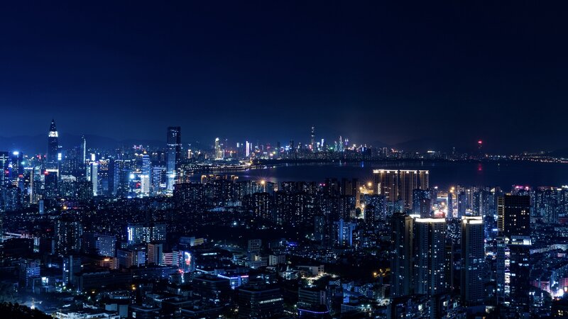 City Skyline at Night — Blue, Dark, Photograph, Skyscrapers, Water
