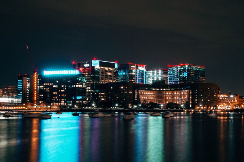 City Skyline at Night — Blue, Dramatic, Photograph, Buildings, Boats