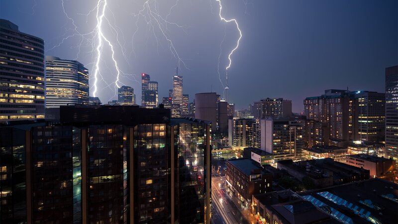 City Skyline at Night — Blue, Dramatic, Photograph, Lightning, Skyscrapers, Streets, Black