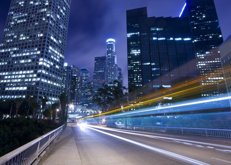 City Skyline at Night — Blue, Dramatic, Photograph, Skyscrapers, Light Trails