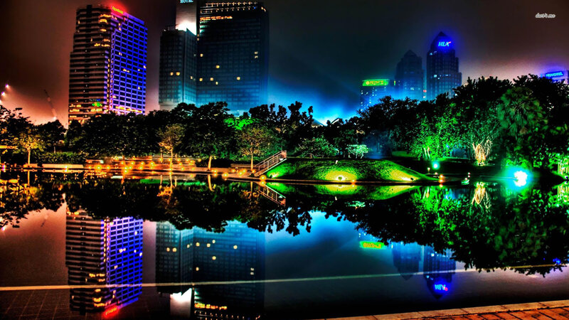 City Skyline at Night — Blue, Dramatic, Photograph, Skyscrapers, Trees, Pond