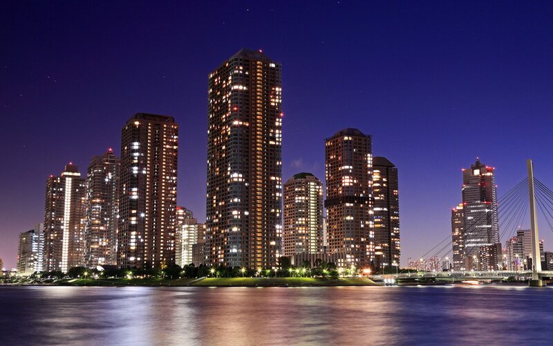 City Skyline at Night — Blue, Serene, Photograph, Skyscrapers, River, Bridge