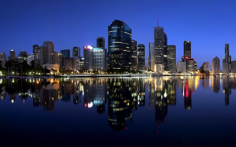 City Skyline at Night — Blue, Serene, Photograph, Skyscrapers, Water, Reflection, Black